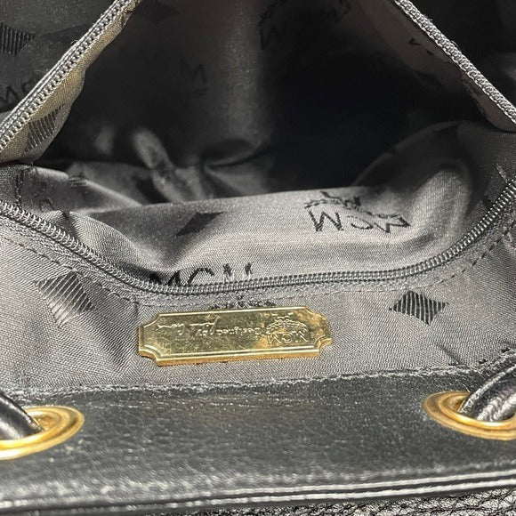 MCM Black Calf Leather Pebbled Gold Plated Multi Stud Flap Drawstring Backpack