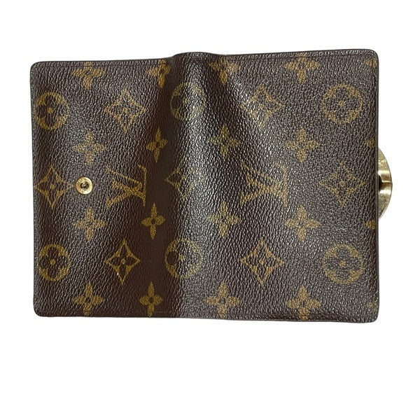 Louis Vuitton kiss hotsell lock wallet