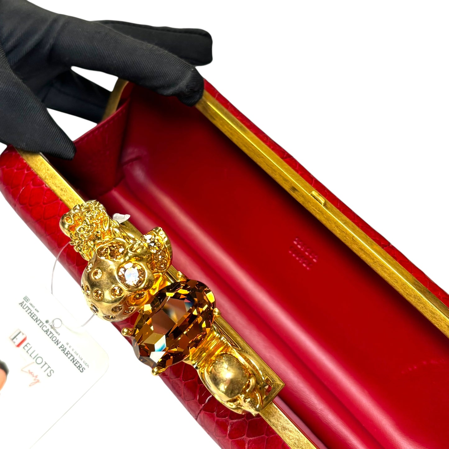 Alexander McQueen Ruby Red Embossed Leather Knuckle Clutch – Gold Rhinestone Skull Hardware